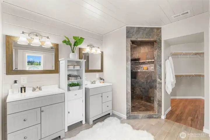 Dual sinks, walk-in rainfall shower head.