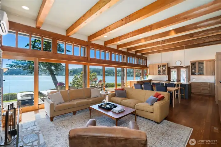 Open concept living with beamed ceilings Open concept living with beamed ceilings