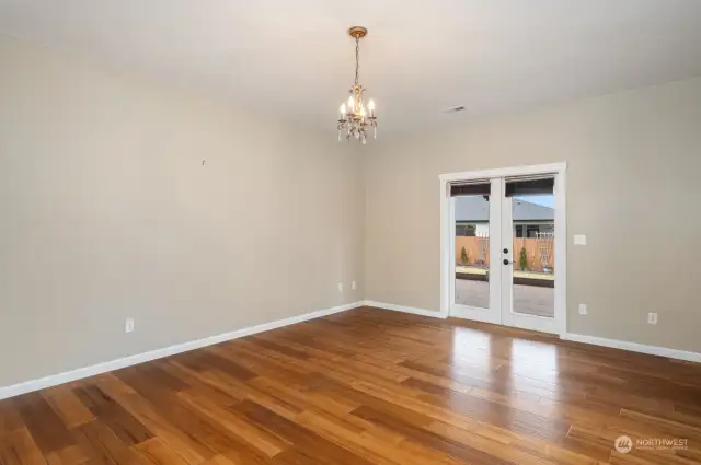 Primary Bedroom with double french door access to covered deck.