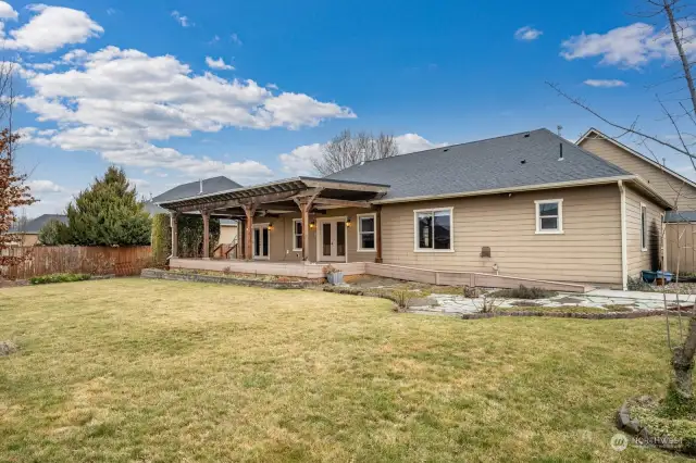 Awesome fenced back yard with covered deck.