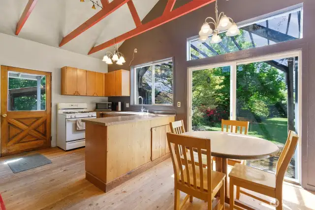 Entry Door, Slider, Kitchen Dining area.