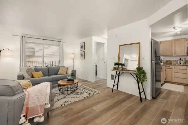 Spacious living and dining room with direct access to private deck