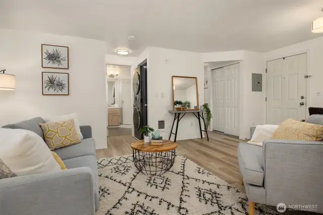 Spacious living and dining room with direct access to private deck