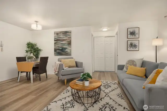 Spacious living and dining room with direct access to private deck