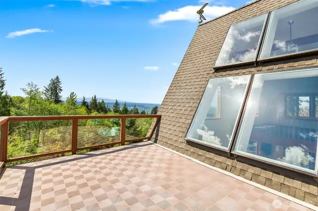 Private deck off of the primary bedroom