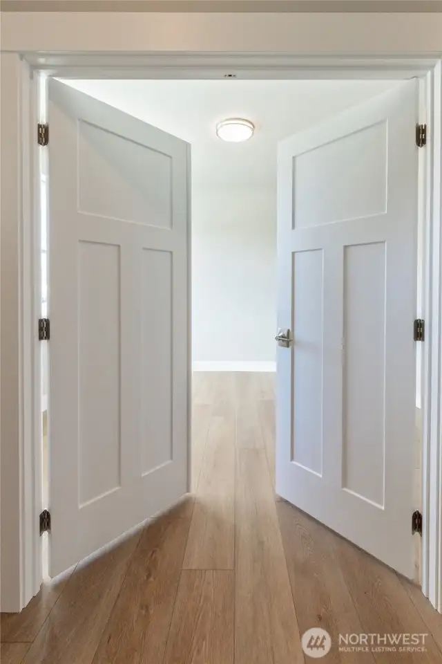 Large bonus room with double french doors