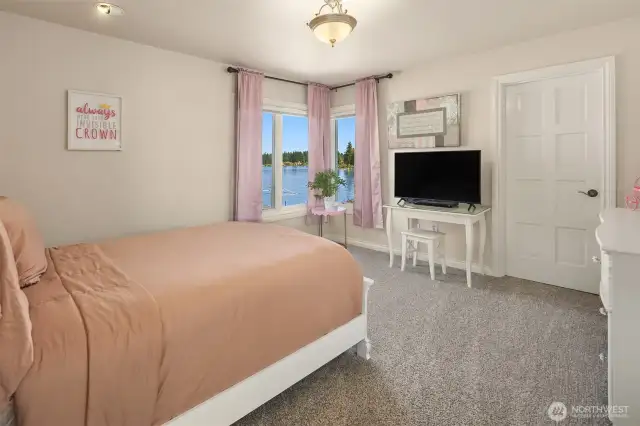 Bedroom 3 is located just off the large loft/flex space. Walk-in California closet. Jack & Jill bathroom with private sink.