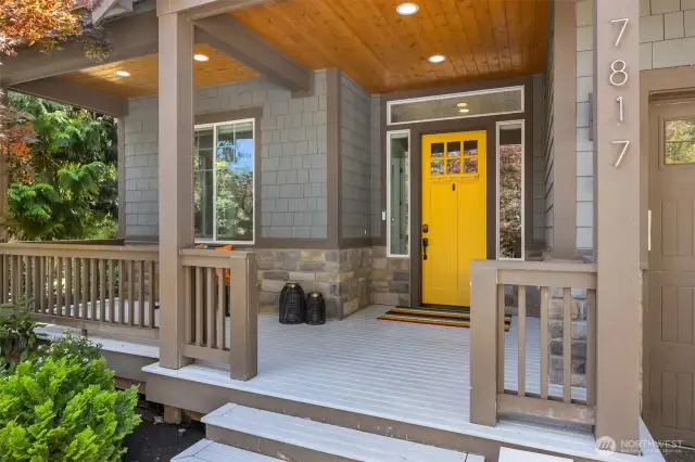Escape the weather on this large covered front porch as you wait to enter.
