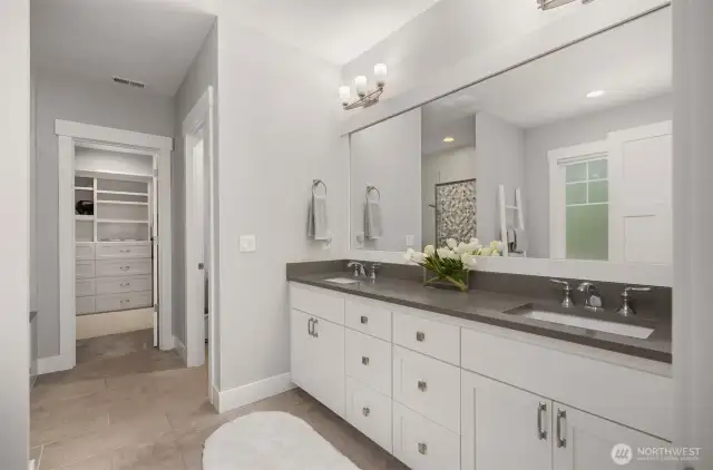 Large primary bathroom with soaking tub, shower, and a water closet (WC)