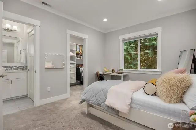 Bedroom 2 with a shared on suite bathroom and walk in closet.
