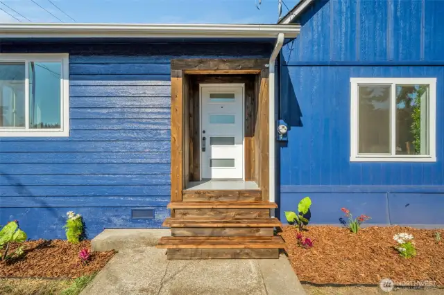 Front door with new flower beds