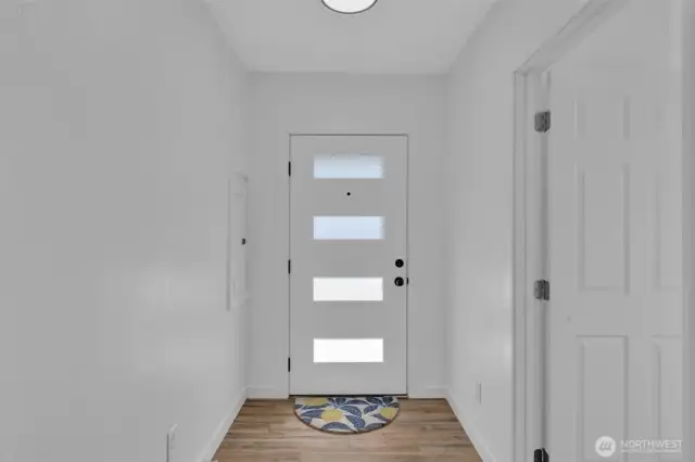 Entry way of home with bedroom number one to the left after you step inside