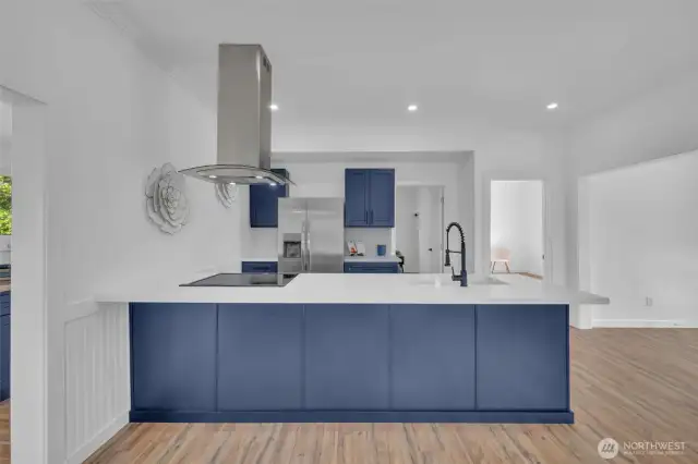 Dark blue cabinets really make this kitchen pop while still maintaining that cozy home feel!
