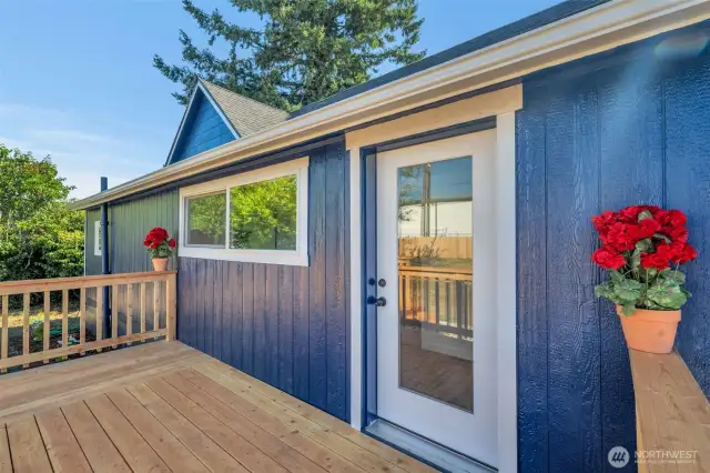 Exit through the back door and step out on to your new beautiful deck!