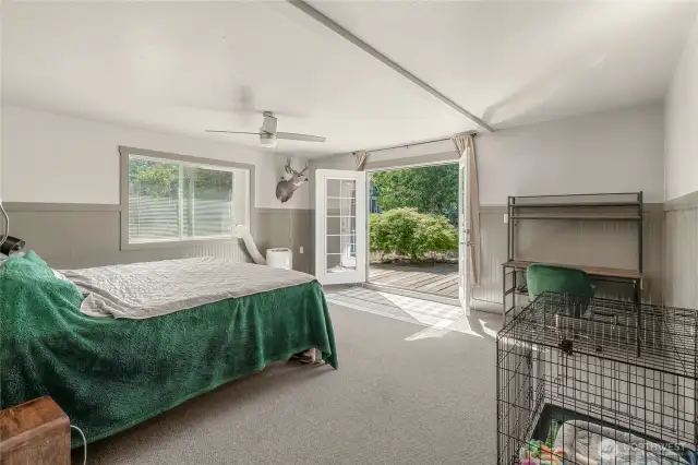 Downstairs bonus room with french doors to lower deck