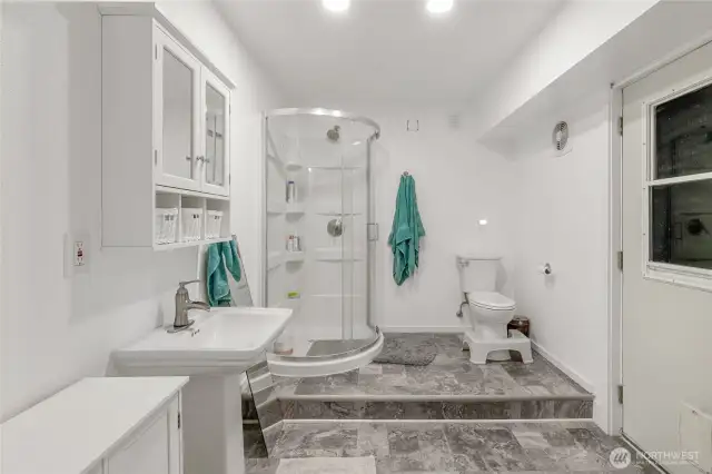 Downstairs 3/4 bathroom with private side door entrance