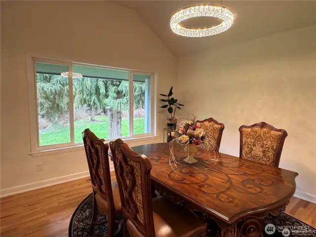 Elegant formal dining room designed for memorable gatherings and plenty of natural light to complement every occasion.
