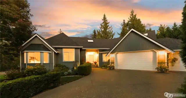 Warm and inviting front view of the home with charming details that make you feel right at home.