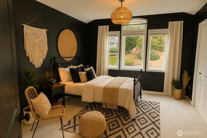 Oversized Bedroom #2 (window looking out to the front of the house). Has dual closets. Brand new carpet installed. Virtually Staged including chandelier