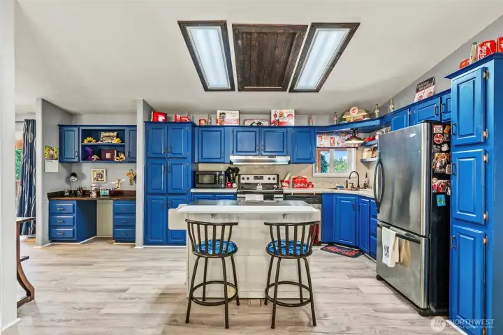 Kitchen with Ample Cabinetry and Desk Space