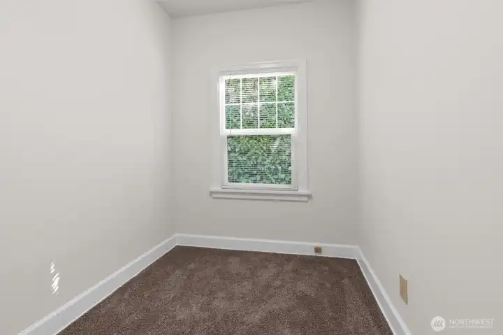Upper level bedroom (one of three).