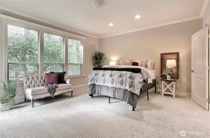 Like the rest of the home, brand new plush carpeting flows into this space, adding warmth and softness underfoot. Your suite is inviting you to leave the day behind and unwind in comfort.