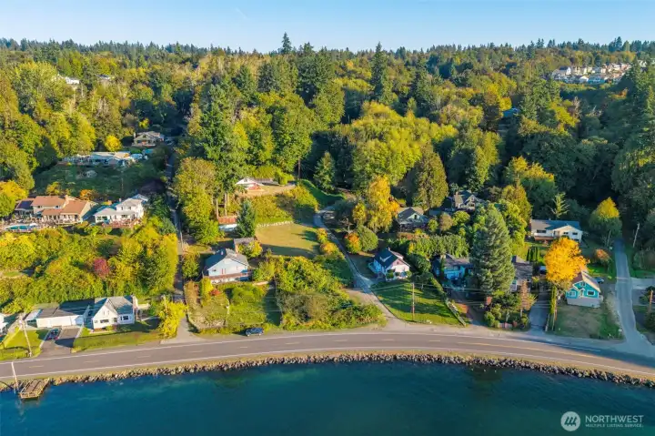 Easement off Beach Drive ... coming from Olney, the easement is on the right before you pass Lidstrom Rd.   Easy access to shopping locally, about 10 minutes to Southworth Ferry and 8 minutes to Hwy 16.  Rare opportunity to own land on BEACH DRIVE.