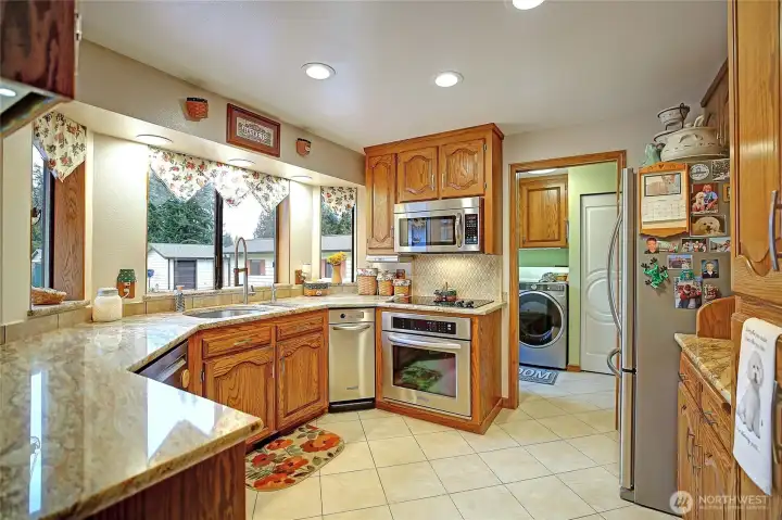Granite counters and heated tile floors..