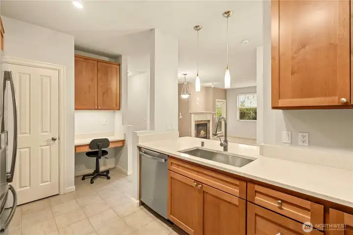 Kitchen has desk workspace