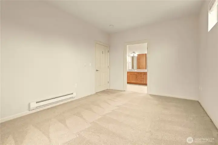 Primary bedroom suite with deck access