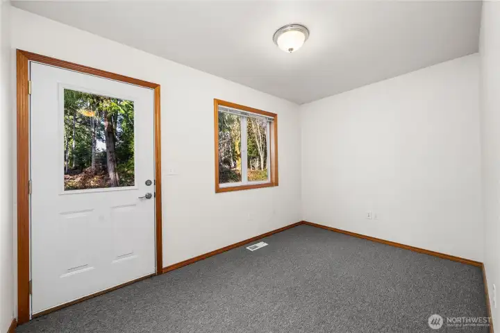 Main Floor Flex Room with exterior entrance.