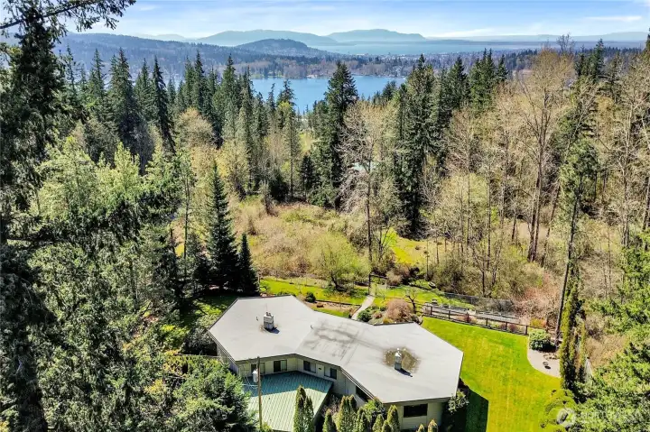 Aerial showing hexagon design and lake Whatcom just .6 mile away.  2nd lot visible past metal fence line.