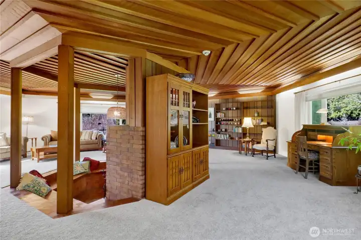 More beautiful cedar ceiling and library for books and art.