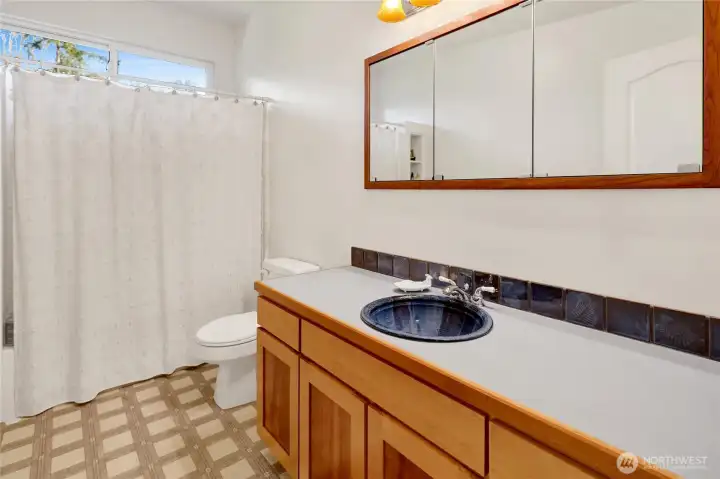 2nd full bath on main level.