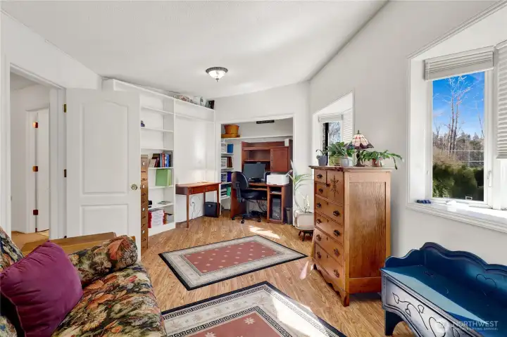 3rd bedroom or study/guest room with double bay windows.