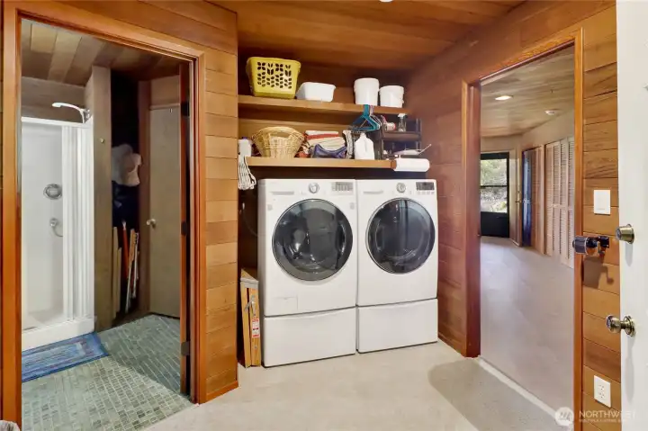 Laundry and additional storage.