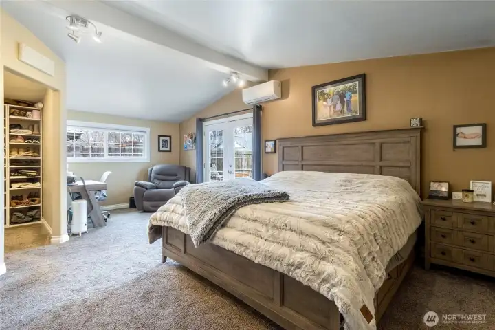 Spacious primary bedroom with walk in closet