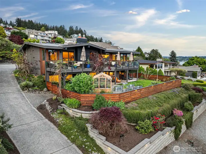 A private driveway introduces to your own slice of heaven off of Pt. Fosdick Dr., located in quiet neighborhood with views to die for on the daily: Hale Pass, Fox Island, Chambers Bay, and the Olympics.