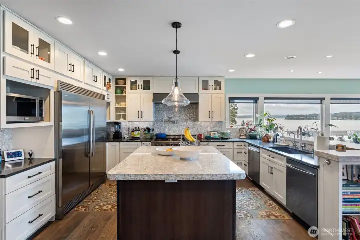 This reimagined kitchen is a chef's delight! Take in the views as you prepare food for guests in this amazing space.