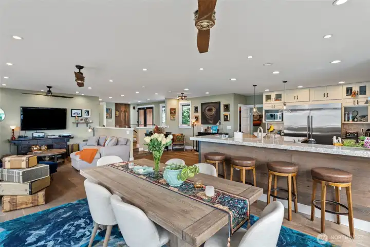 An open-concept floor plan allows for easily having a large crowd gather here.