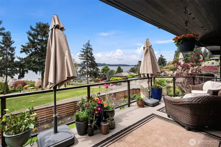 Two decks, one off the dining/living room, and another private deck off of the primary suite, allow for enjoyment of the views all day and night. Enjoy fireworks on the 4th of July from this expansive deck, too.