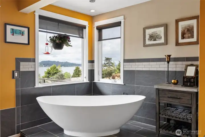 A vessel tub makes a statement in this room.  Enjoy relaxing after a long day and taking in the incredible scenery from here.