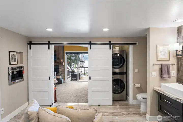 .....your own in-wall coffee maker, stackable washer and dryer, and barn doors.
