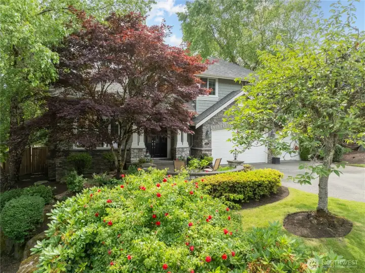Set amidst lush, mature landscaping in The Highlands at Newcastle, this inviting home offers picturesque surroundings with easy access to Cougar Mountain trails.