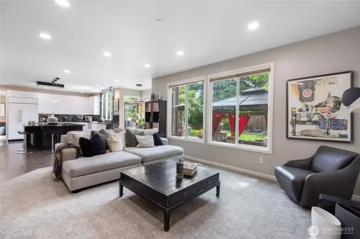 Open-concept layout seamlessly connects kitchen, dining, and living areas—ideal for modern living and entertaining.