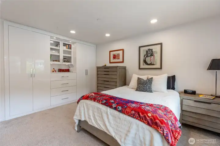 Bedroom #3 has high-end custom closets with Italian lacquer cabinetry, built-in drawers, and shelving.