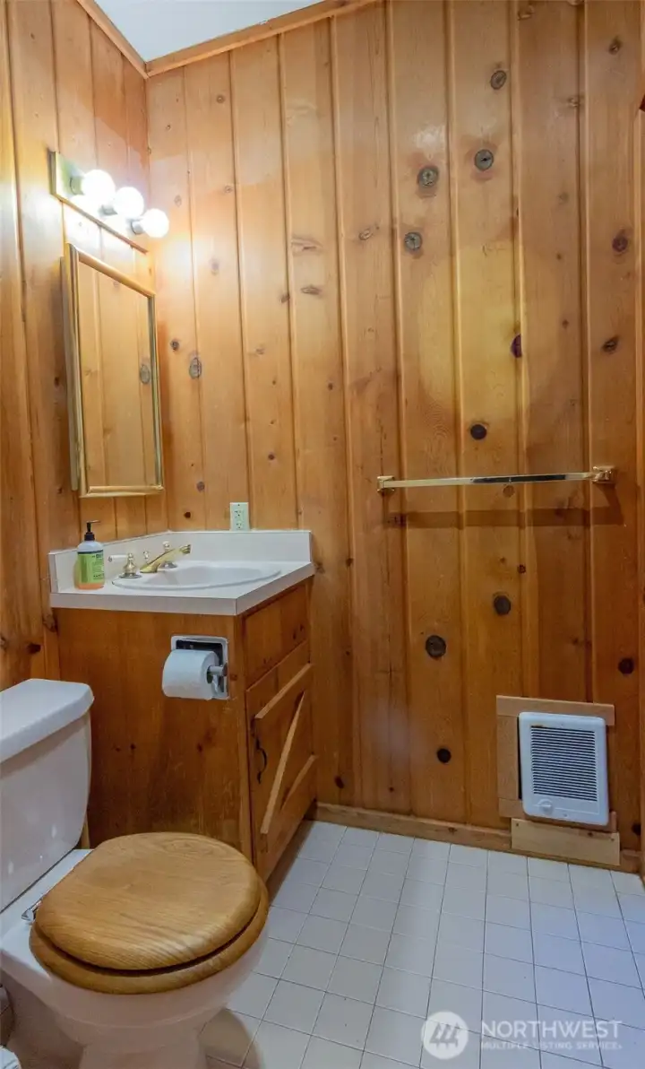 The bathroom features a jetted tub and has lots of counter space.