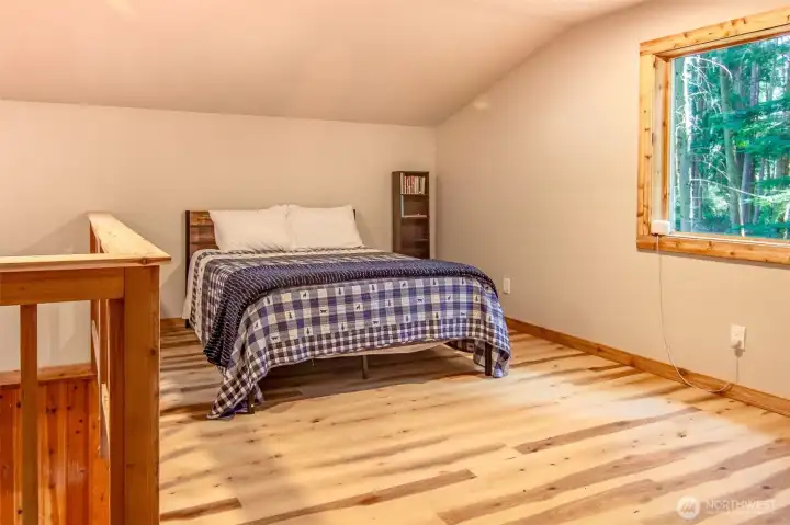 The upstairs sleeping area is HUGE!  Lots of room for extra storage and bedding for other guests!