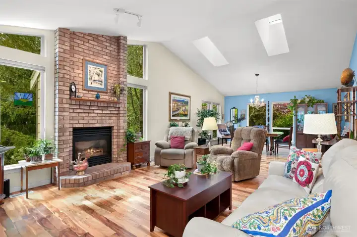 Vaulted bright ceilings open to the spacious dining room.