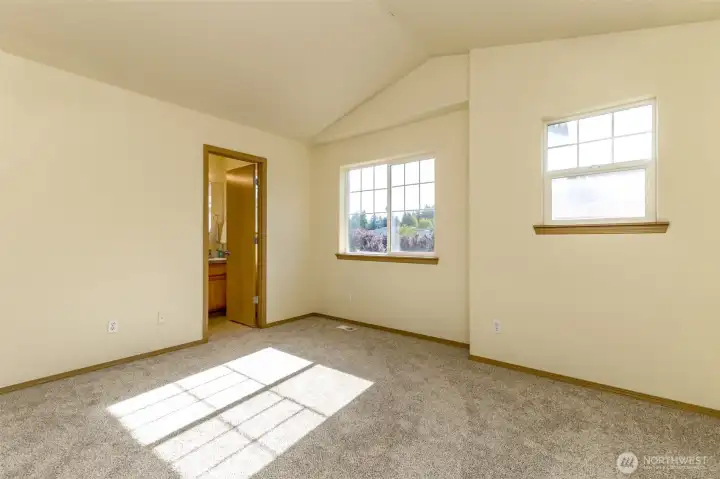 Primary bedroom facing the bathroom. Primary bedroom facing the bathroom.